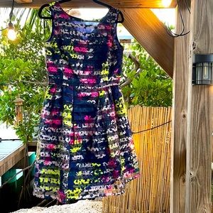 Multi colored dress with flaired skirt,navy with pinks, chartreuse size 8